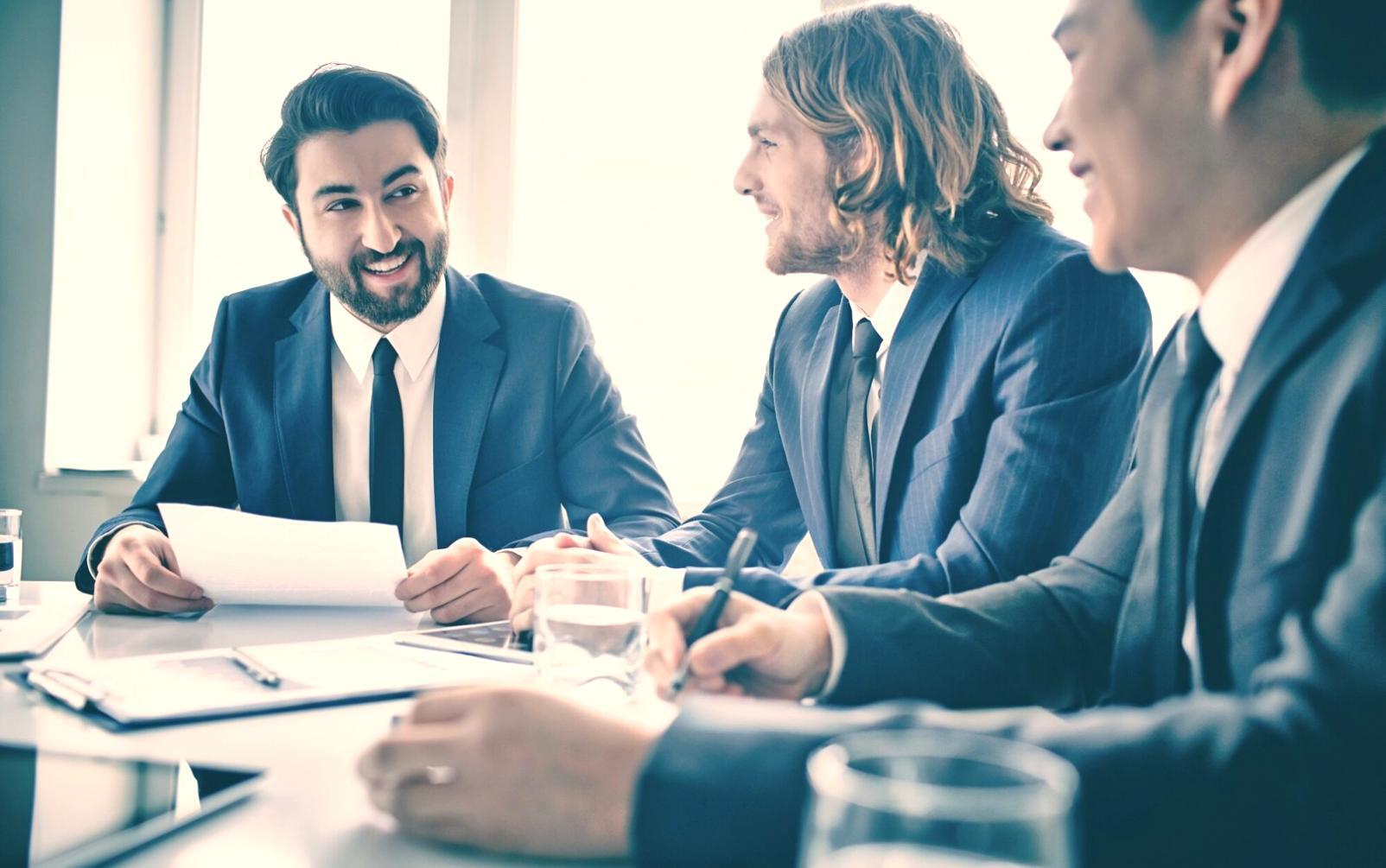 Person reviewing weekly budget planning documentation with financial charts